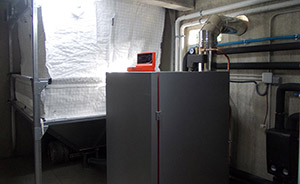 Instalación caldera pellets con apoyo de energia solar para clefacción + ACS en vivienda unifamiiar.